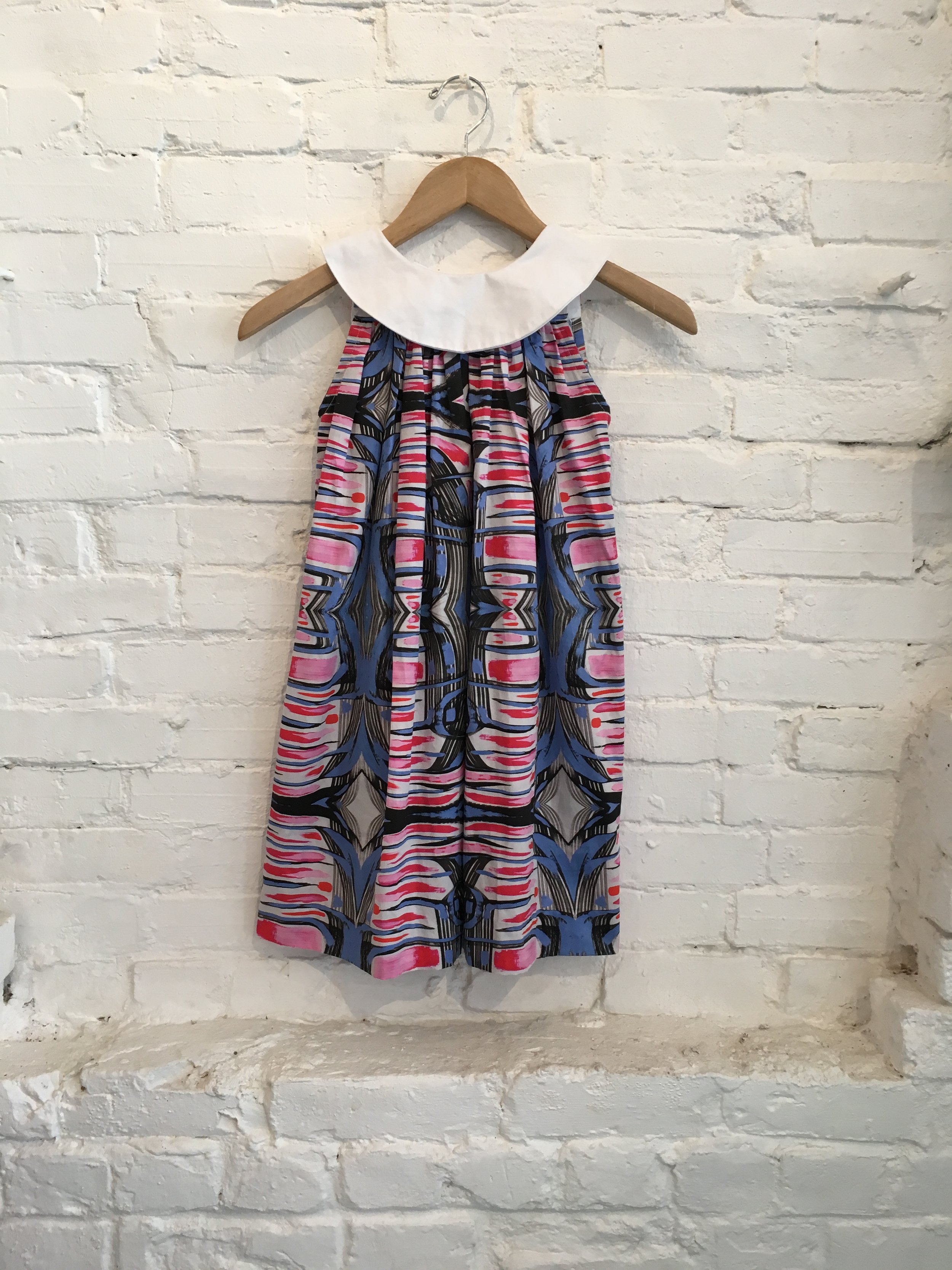 The "Sally" dress, available in sizes 2T- 10. $135