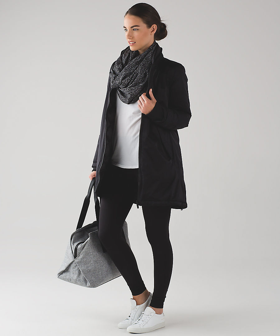 Lululemon's signature look, featuring a $58.00 wrap scarf, $98 yoga pants, with coordinating bag and shirt.