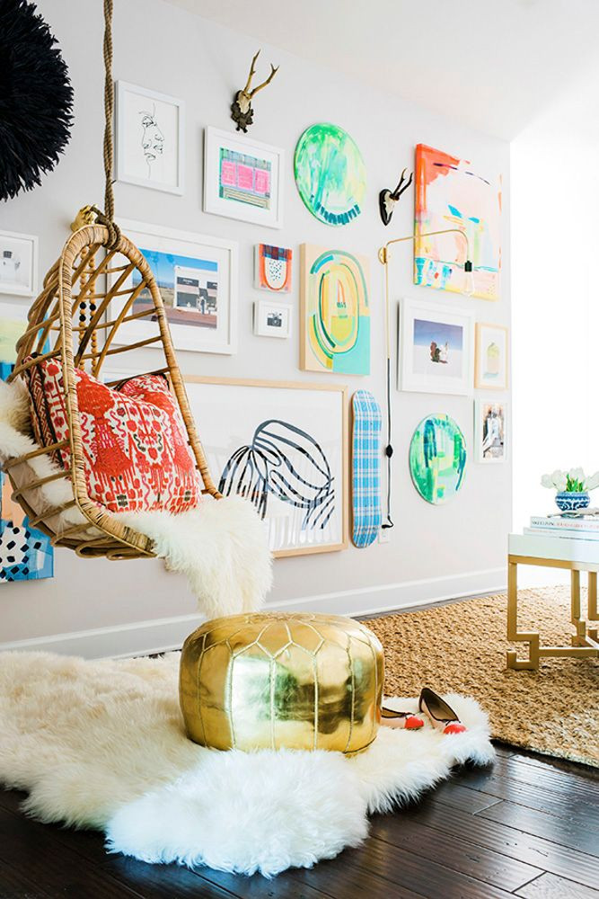 3-D gallery wall featuring an eclectic mix of art and objects