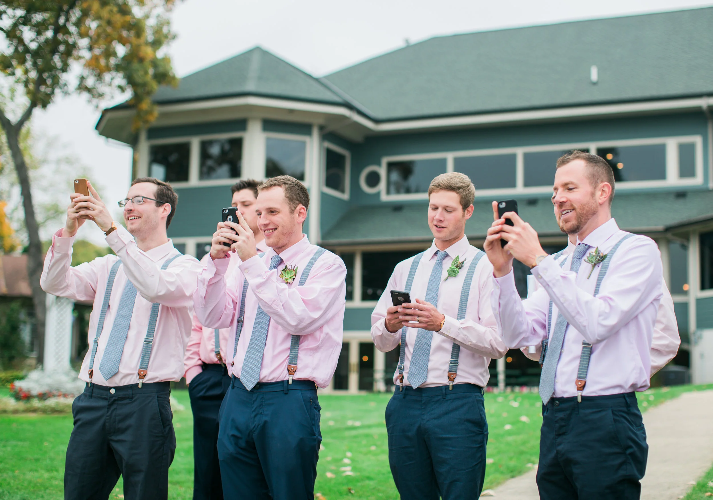 As I was taking pictures of Jon, so were ALL of his grooms men. So glad my second shooter, Brittney, got this photo! 