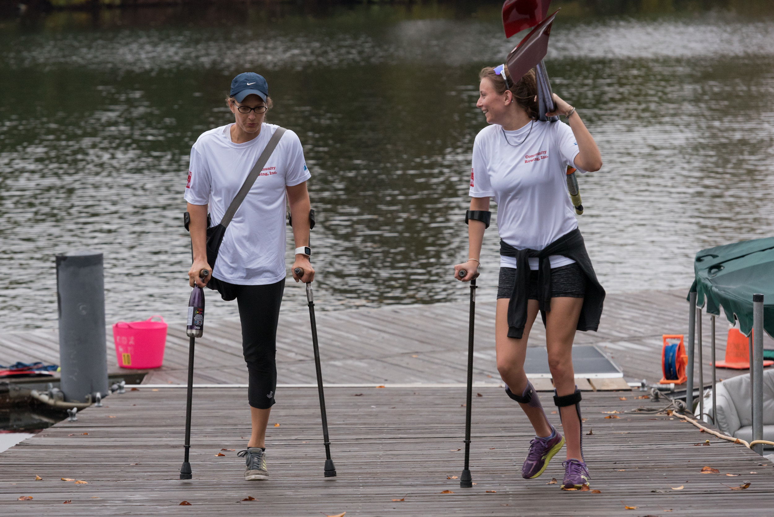  Left to right, Johanna Beyer, 35, and Kate Barrett, 24, talk after rowing practice on Tuesday, Oct. 18 outside Community Rowing, Inc.’s boathouse. Beyer competed in inclusion doubles on the morning of Sunday, Oct. 23 and Barrett competed in inclusio