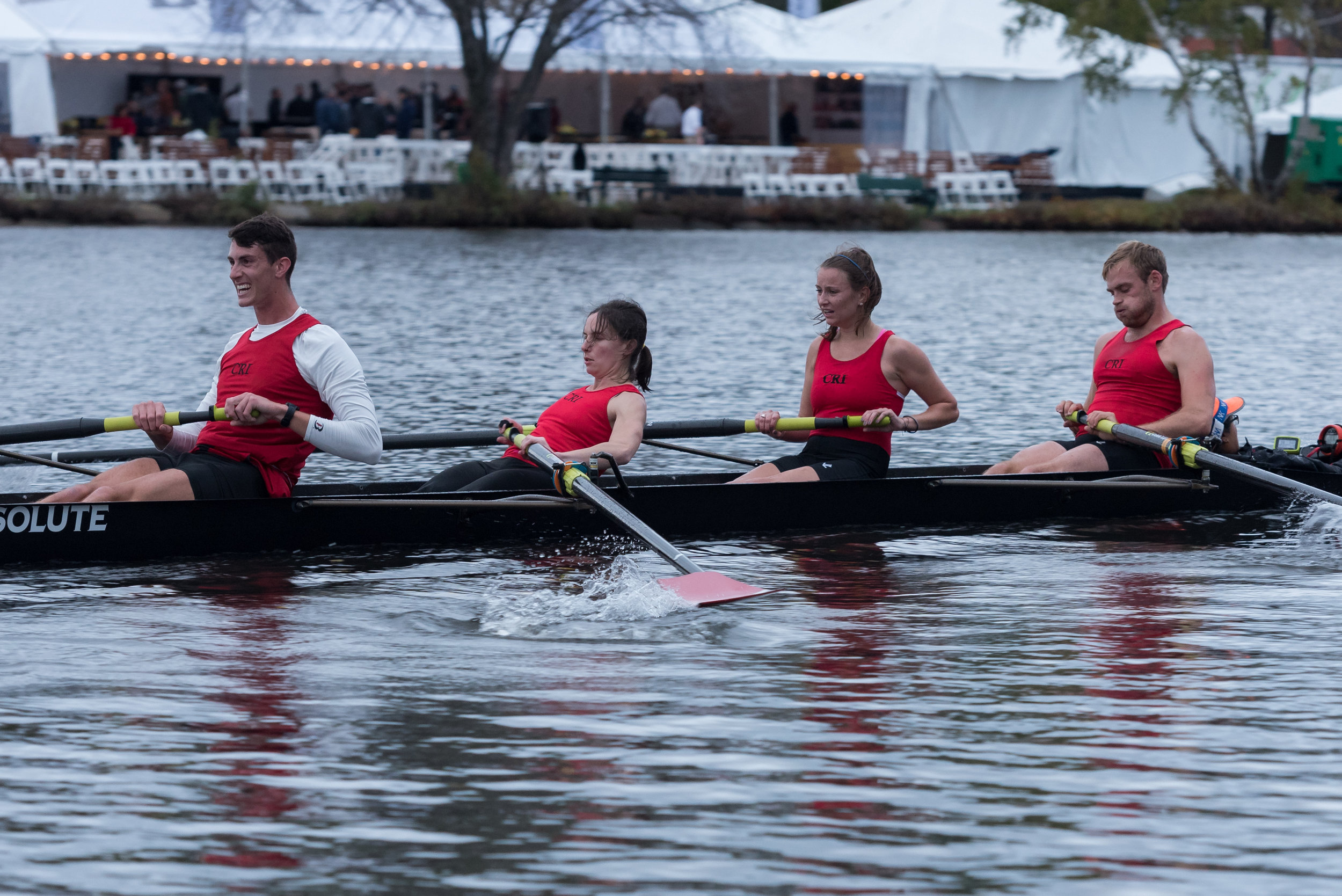  Members of Beth Noll’s inclusion four team row after passing through the Elliot Bridge at the Head of the Charles regatta on Saturday, Oct. 22. They won the race by 21 seconds, with a time of 19:37.897.&nbsp; 