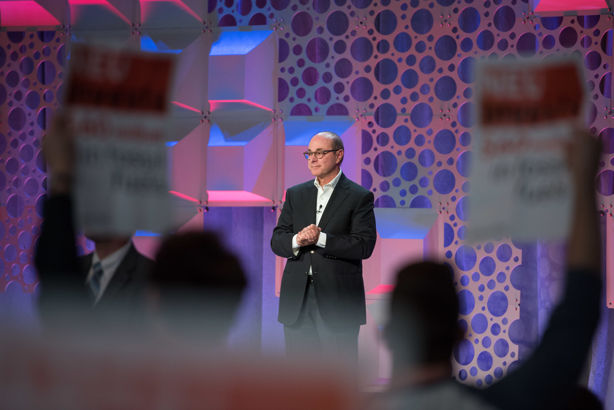  Northeastern University President Joseph Aoun stands silently while DivestNU protesters protest during the 2016 State of the University event on Thursday, Oct. 20. DivestNU members began to stand up and disrupt the presentation as soon as Aoun took 