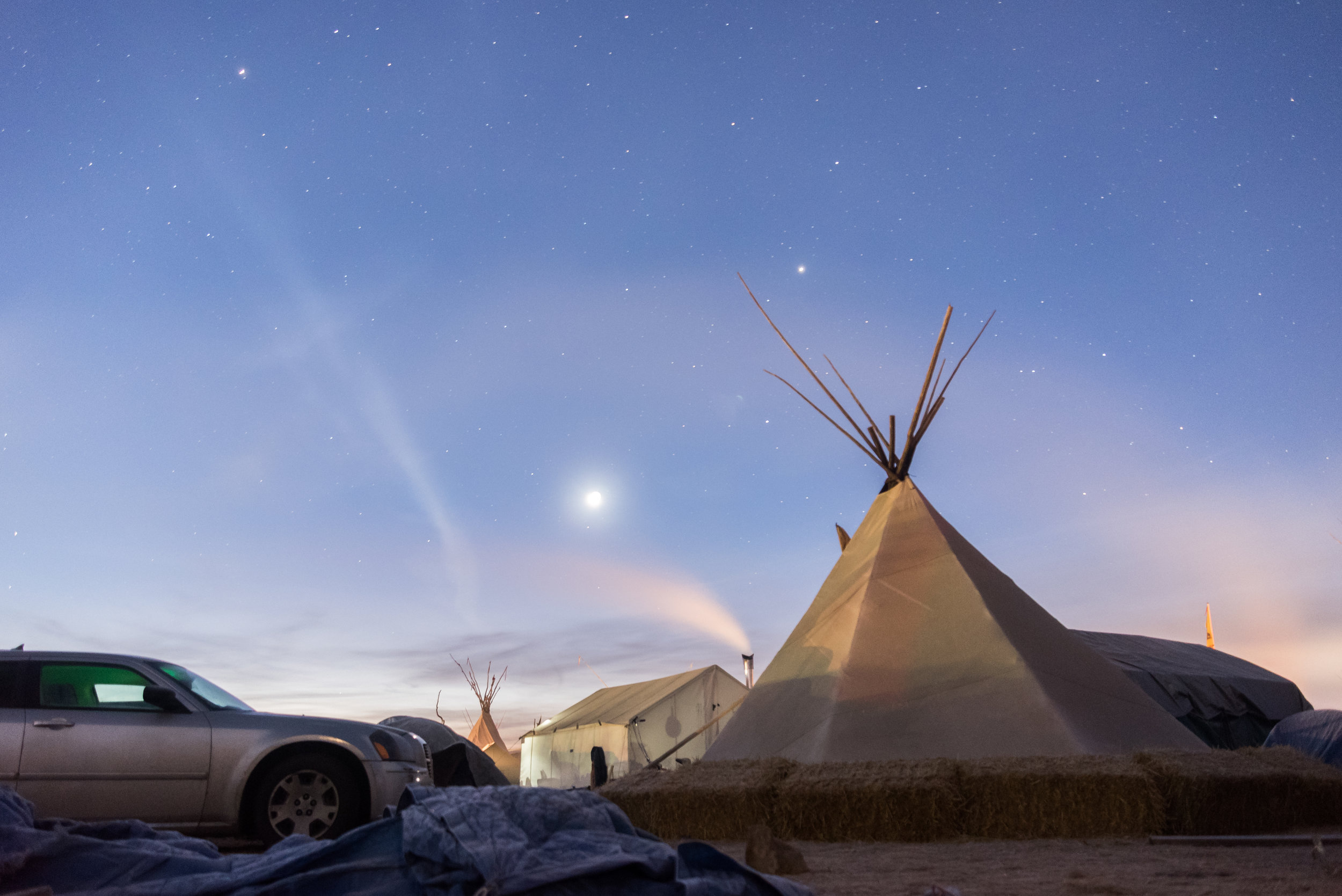  CANNON BALL, North Dakota — Stars fade in the early morning in Oceti Sakowin on Saturday, Nov. 26.&nbsp; 