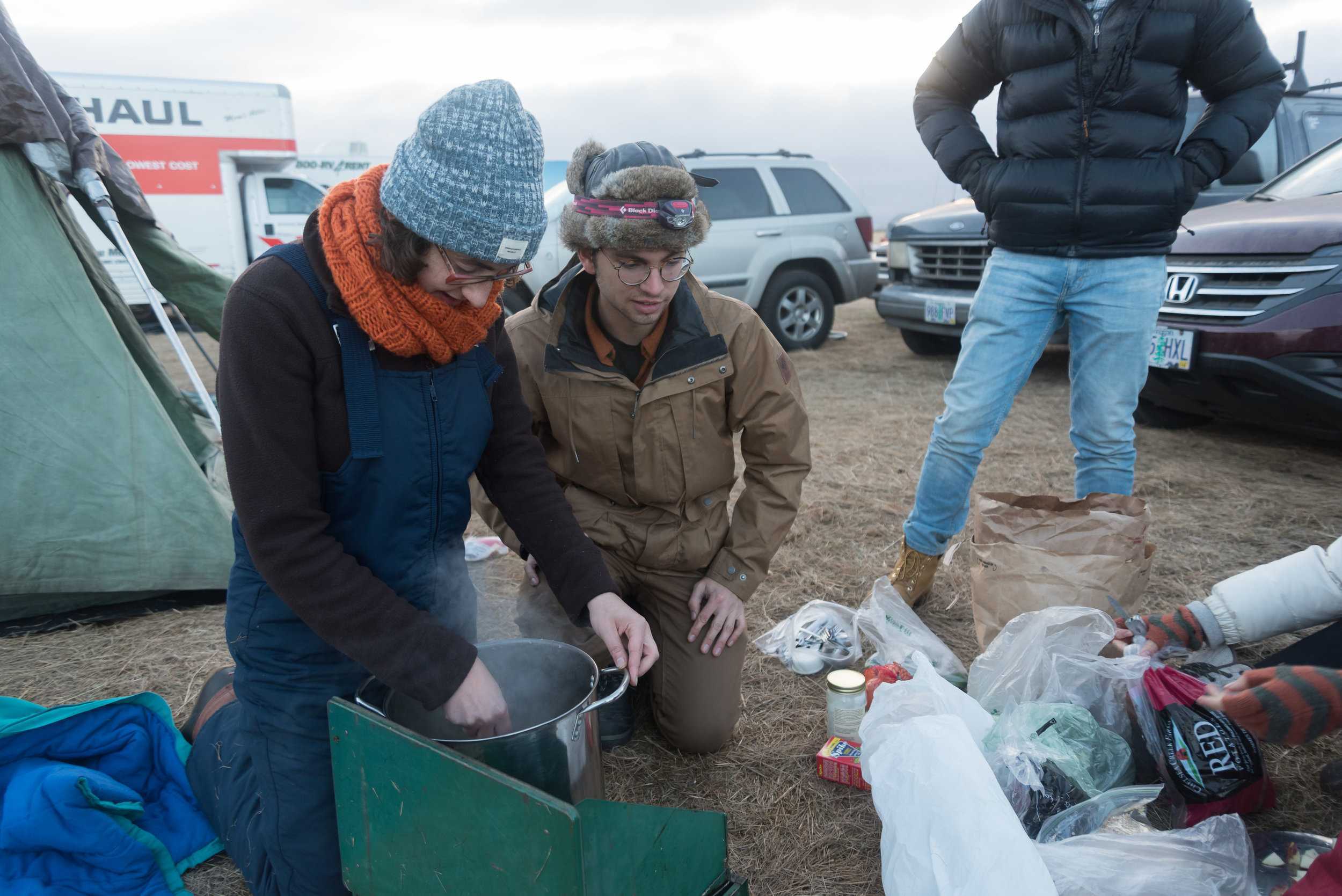  CANNON BALL, North Dakota — Northeastern University students cook soup for dinner on Thursday, Nov. 24. The students travelled over 32 hours by van from Boston, Massachusetts and gave up their Thanksgiving break to protest with other water protector