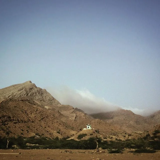 Sufi shrine nestled into Baluchistan hills.