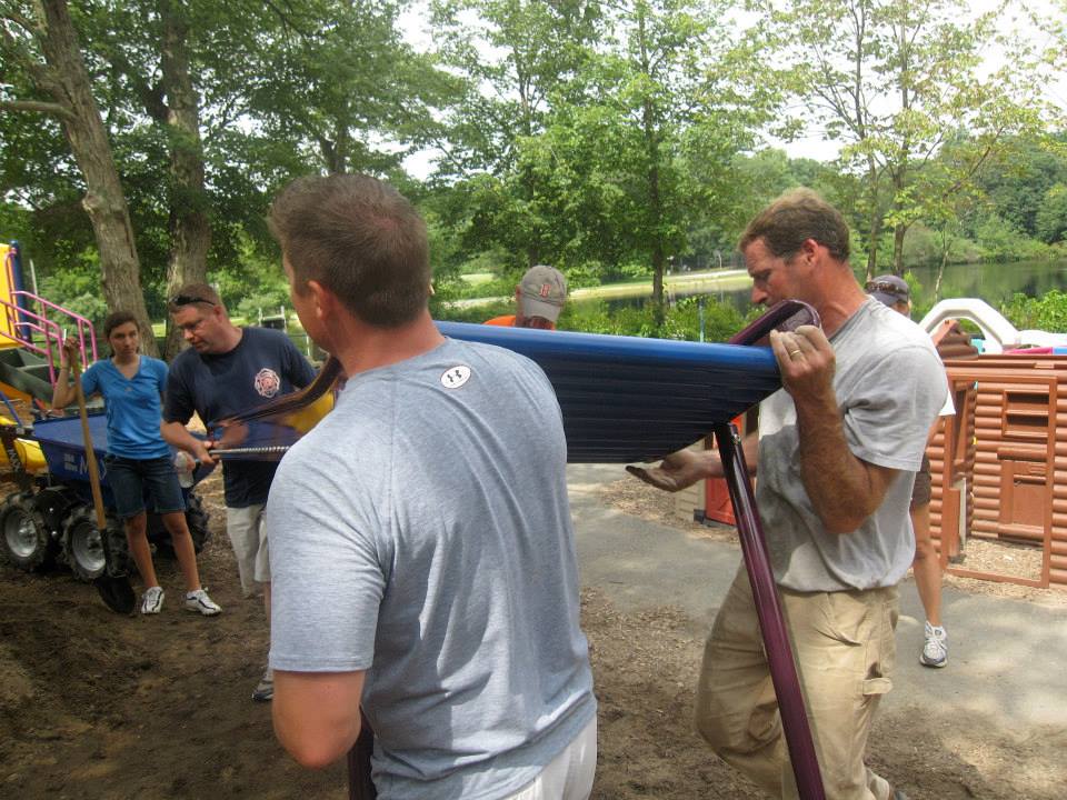 Jeff helping install playground equipment at Choate Park