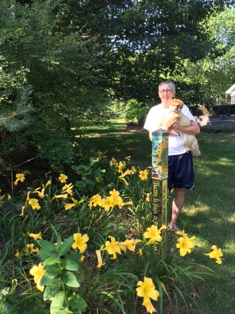 Dr. Blackburn with dog Mushu