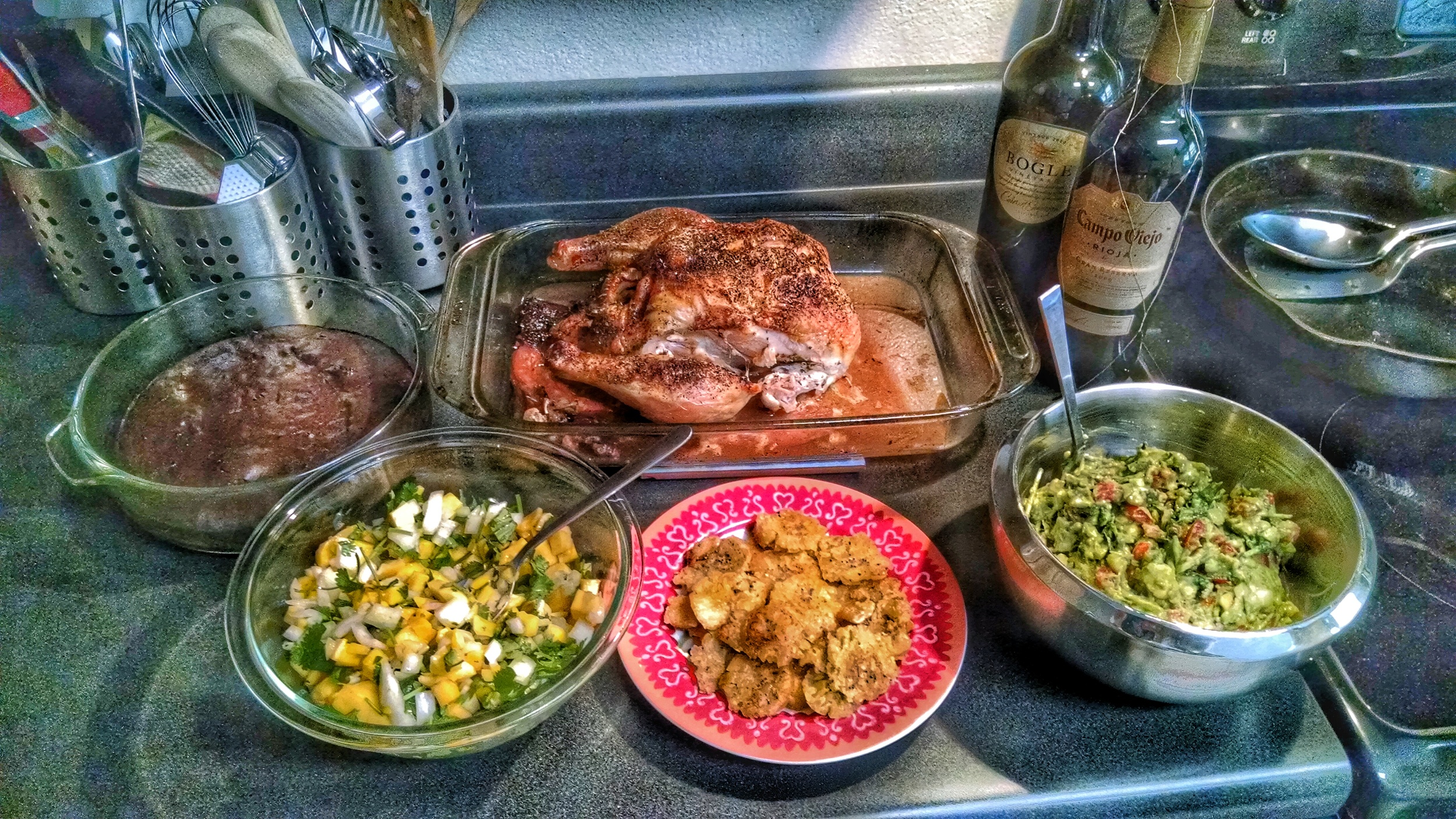 Oven-roasted organic chicken, plantain chips, guacamole, mango salsa and for dessert paleo dark chocolate cake topped with heavy whipping cream. 