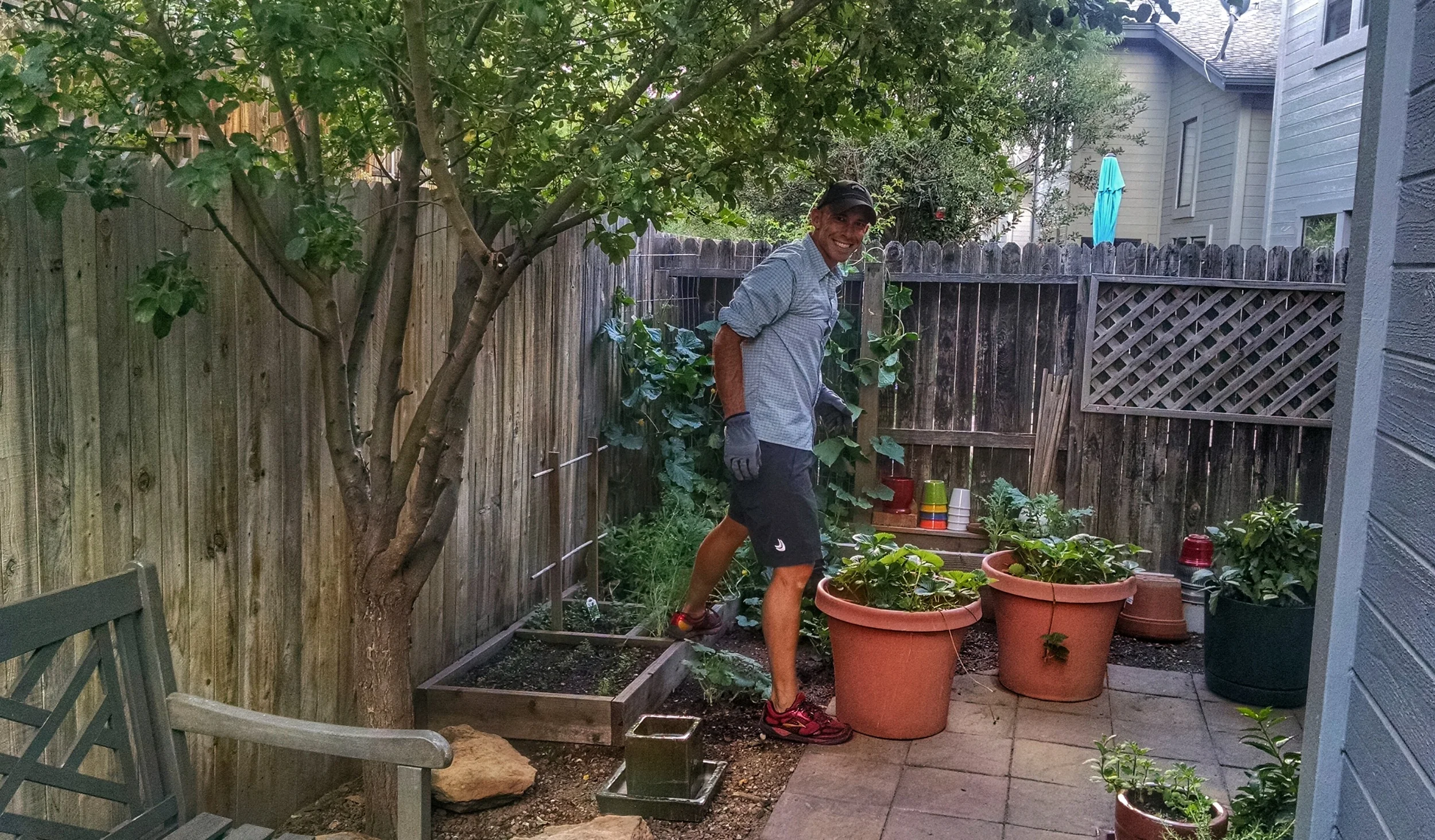 Here MattyB is working in our tiny little garden. We don't have a large backyard, but I am amazed at how much we can grow in such a tiny space. And it is so rewarding to be able to step right into your backyard for fresh produce for your meals. 