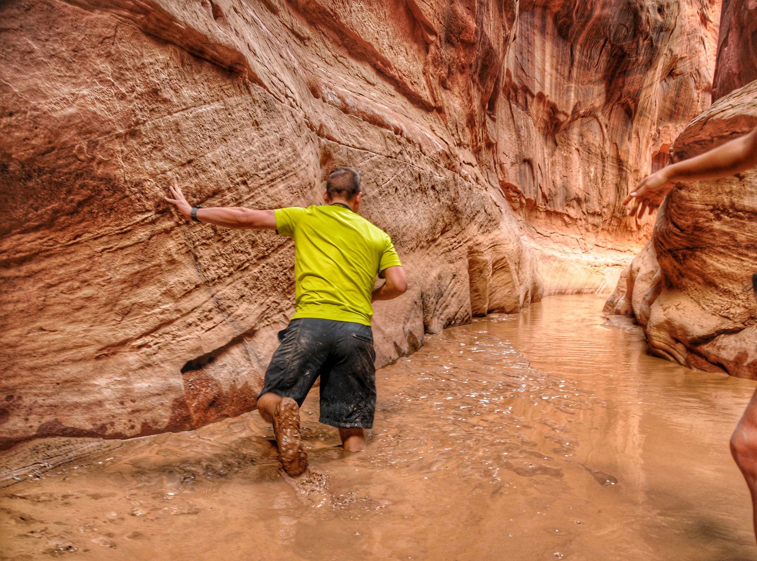 Tom realizing just how far he could slip into the mud in Buckskin