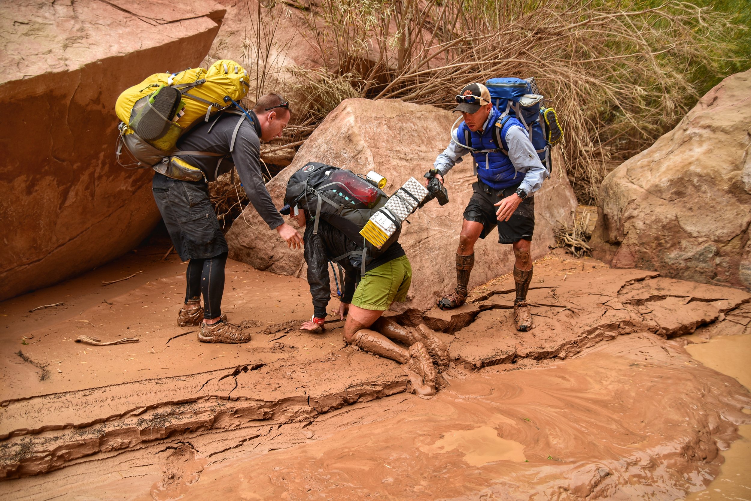 Shortly after rescuing Dora, it was my turn to fall in. If you look closely, you can see the ground breaking away under Matt as he tries to pull me out.