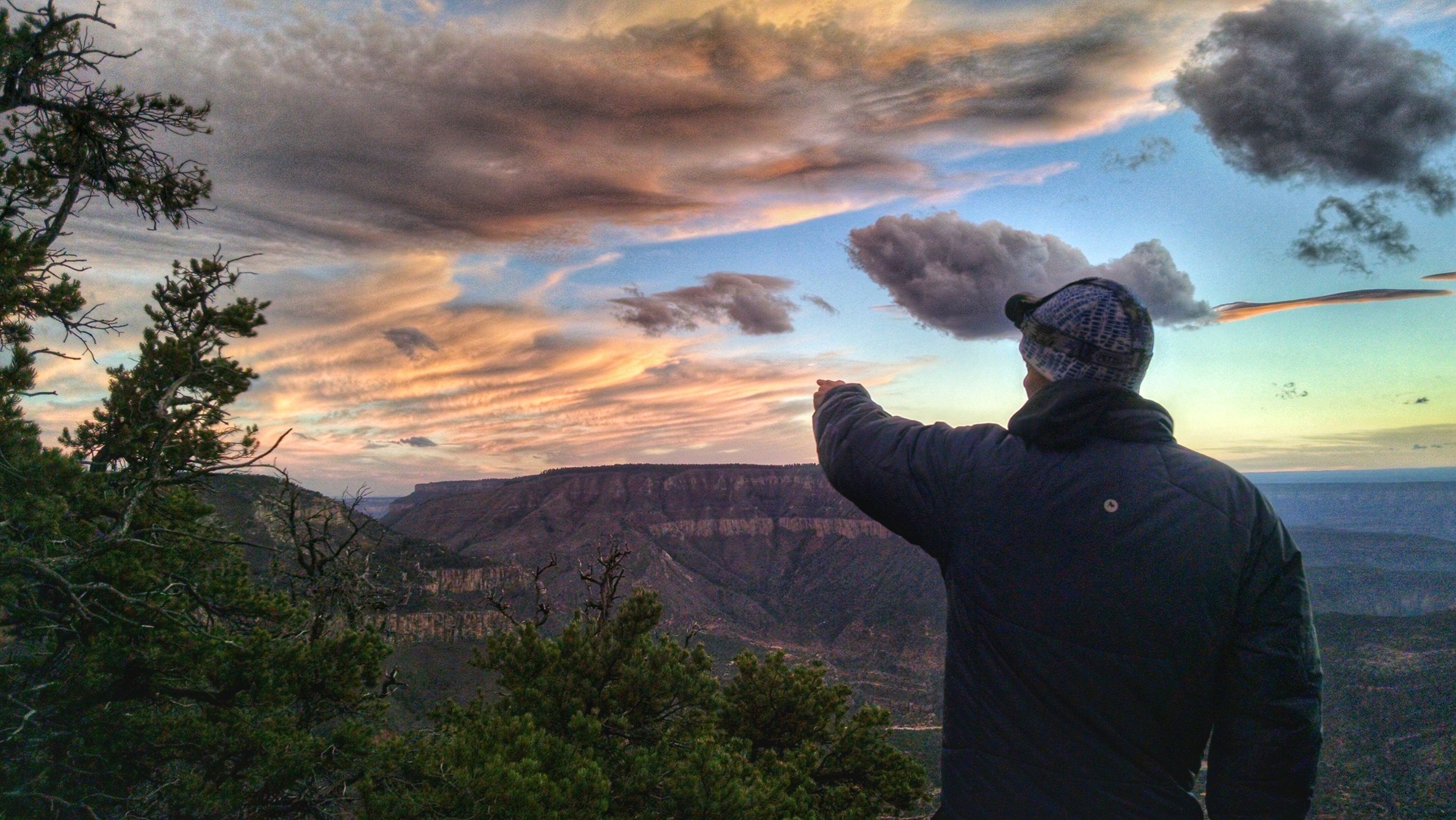 Pointing out all of the amazing clouds in the sky.