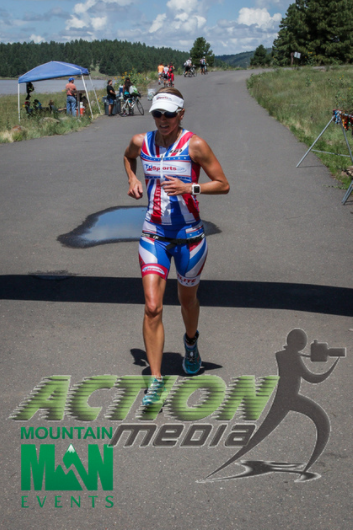 Crossing the finish line as first overall female at MountainMan Half and setting what I believe is a new female course record. 