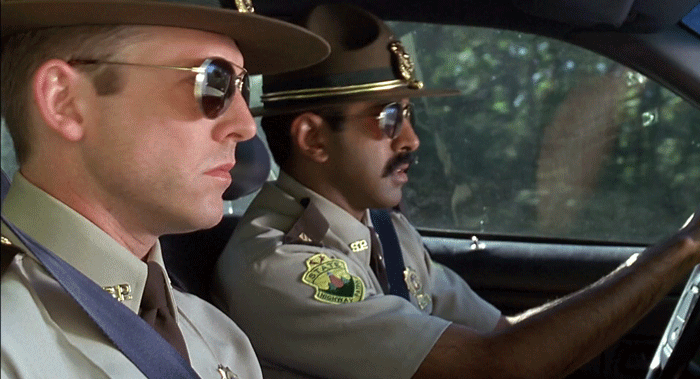 Yep, pretty sure he looked just like these two, aviators and all. 