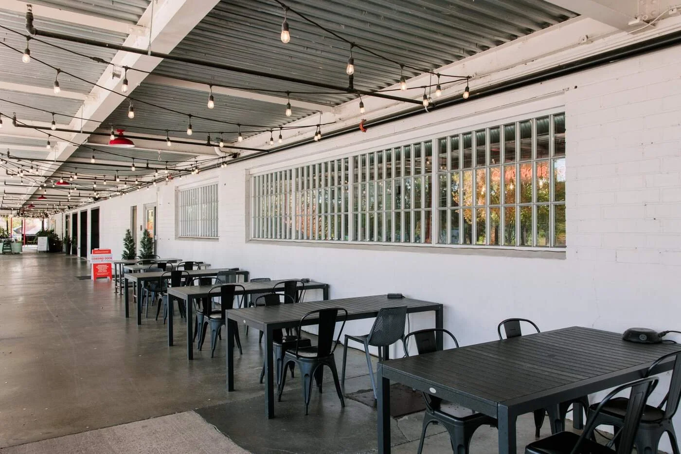Dock-1053_Exterior_dock-platform-tables-chairs-angle2_2025.jpg