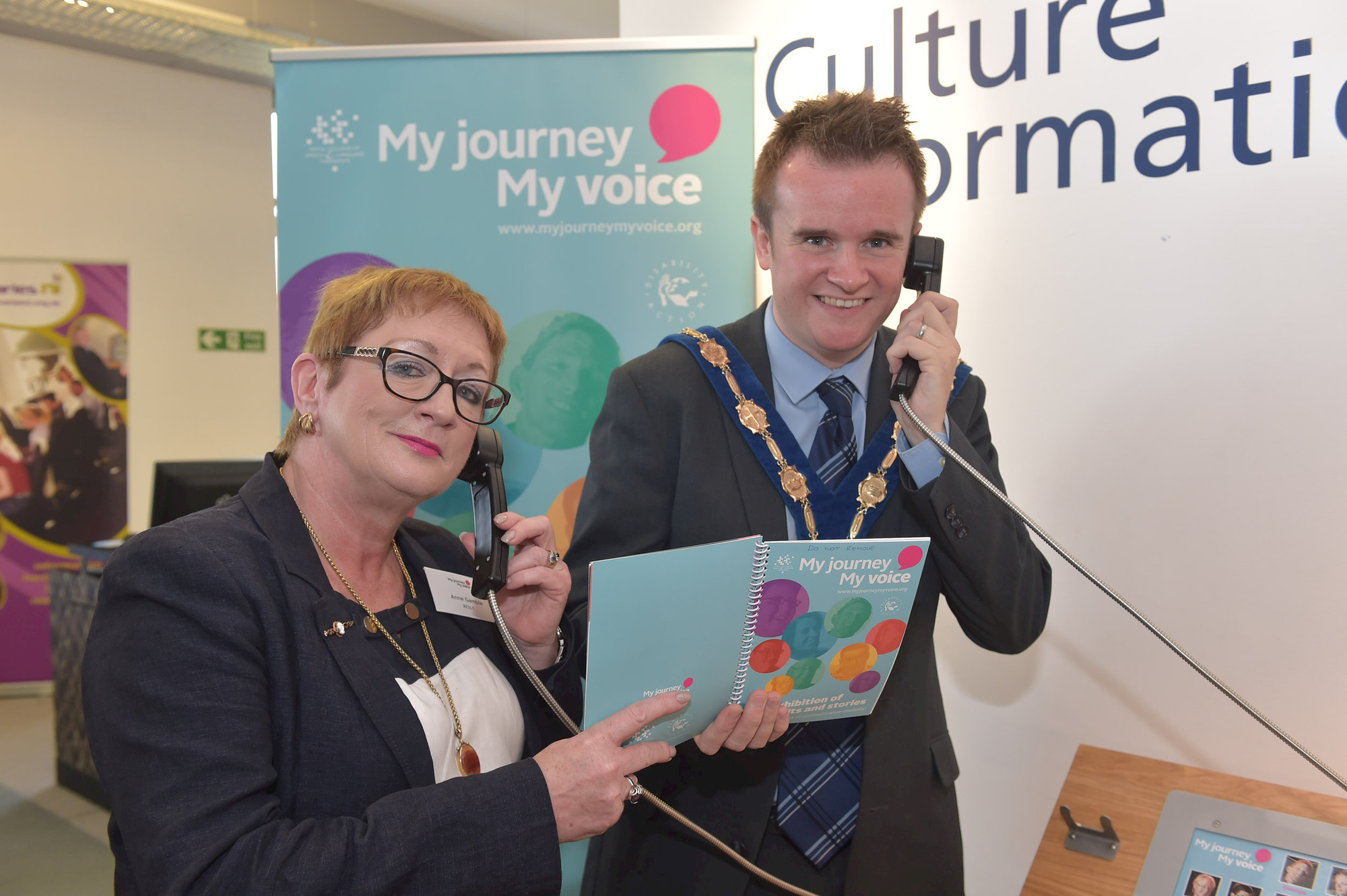 Anne Gamble, RCSLT NI Country Representative and Deputy Mayor Stephen Martin listen to the stories of our participants at Lisburn City Library