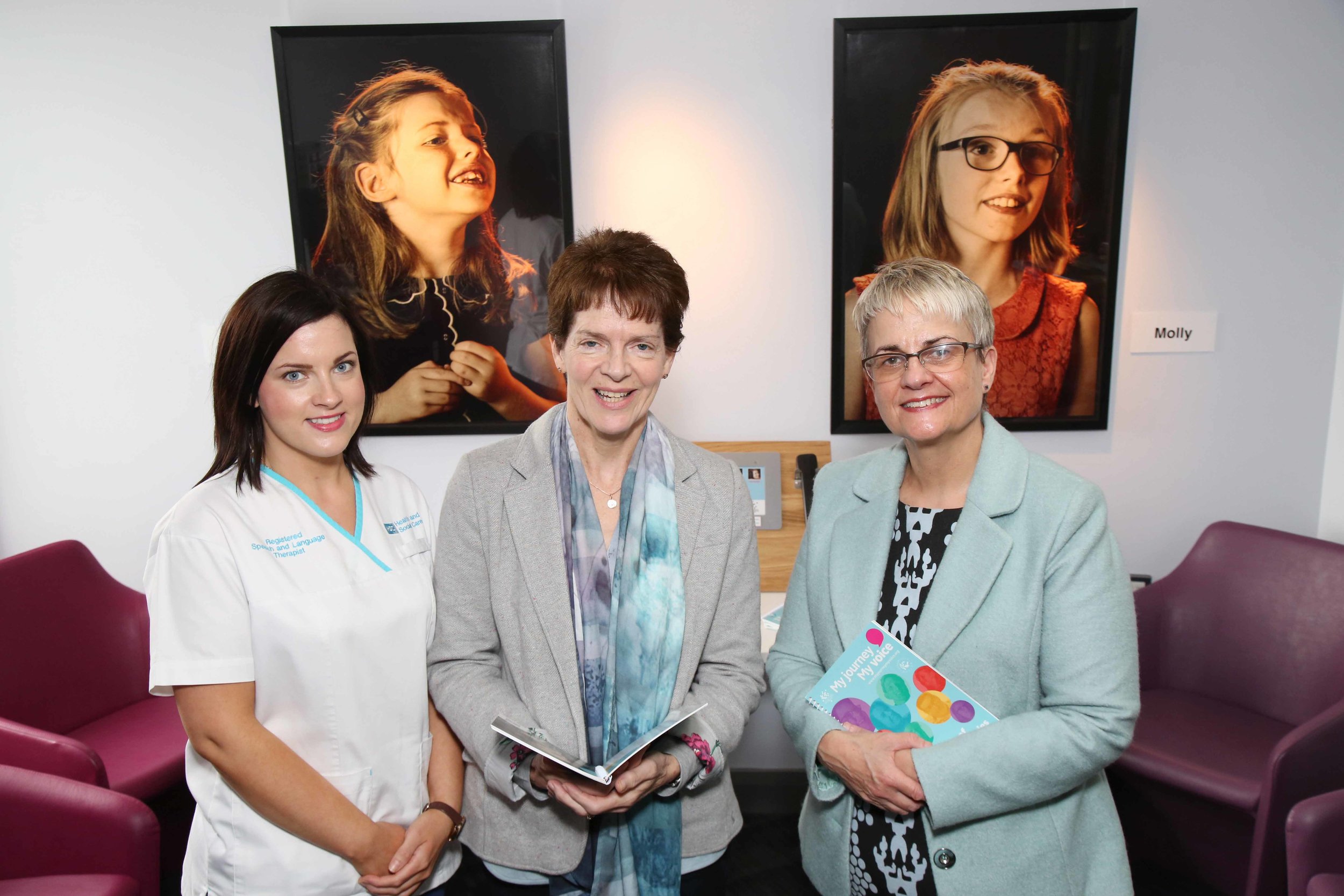  Joan White, Northern Trust speech and language therapy manager (centre) and Danelle McNulty, speech and language therapist (left) welcomed Margaret Ritchie MP to the exhibition. 