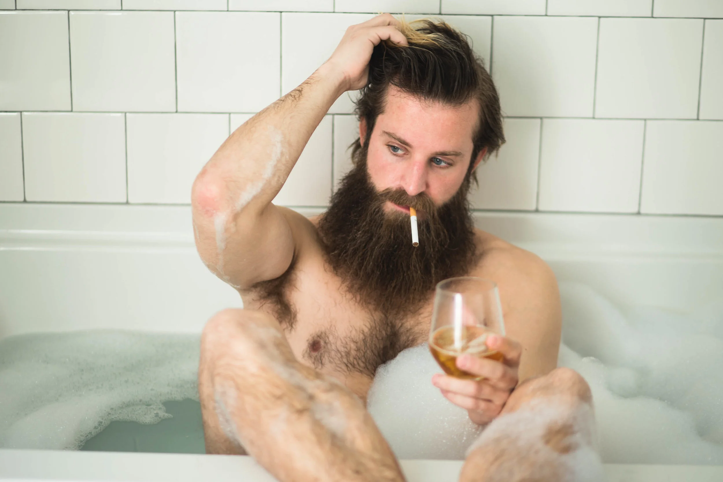 oklahoma boudoir photographer, okc boudoir photography, male boudoir, dudoir, sexy male photos, bathtub photos, bearded guy in bathtub, beard, hairy boy, cigarettes in bathtub, sexy