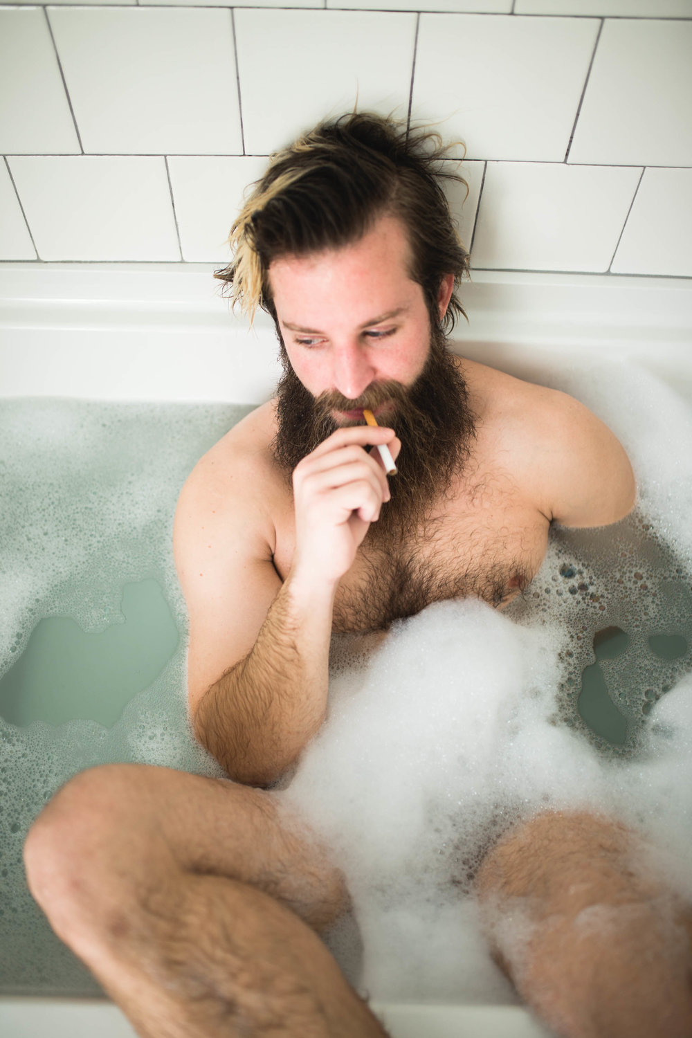 oklahoma boudoir photographer, okc boudoir photography, male boudoir, dudoir, sexy male photos, bathtub photos, bearded guy in bathtub, beard, hairy boy, cigarettes in bathtub, sexy