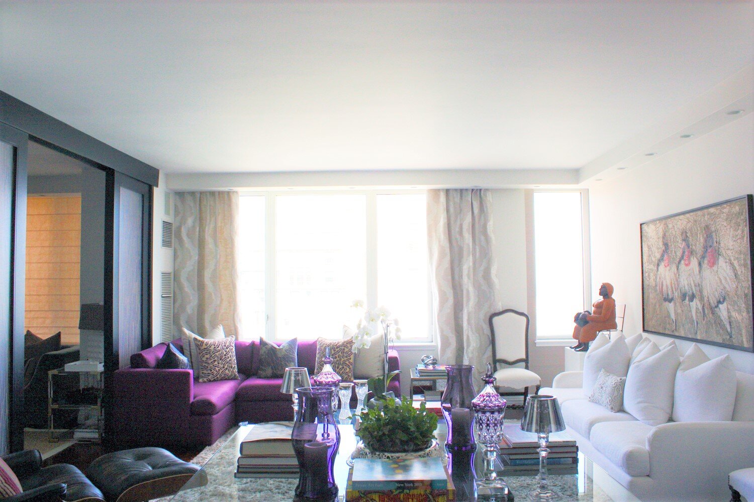 Elegant modern living room purple couch.jpg