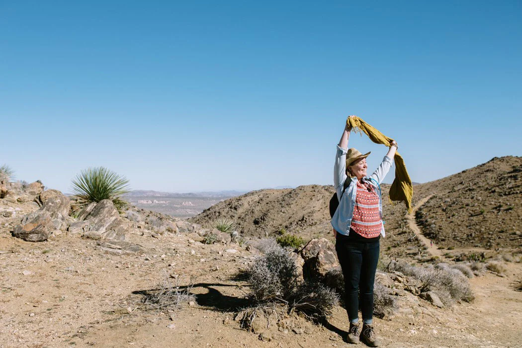 Hiking Joshua Tree National Park is one of the best experiences if you come prepared. Don't forget your hat (scarf optional). Photo by Ryan Tuttle.