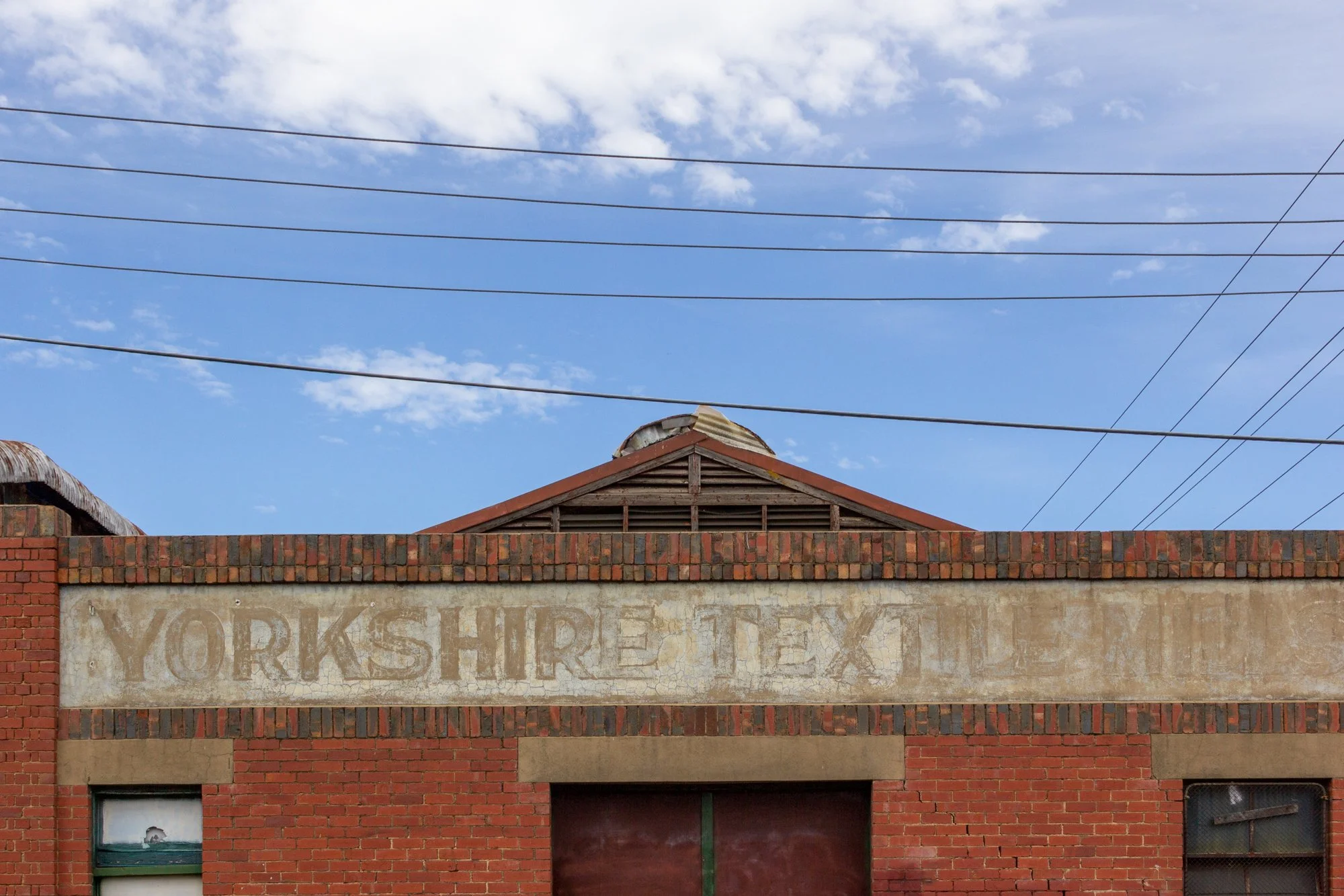 Once a hub of trade and making, now a fading imprint on the wall &mdash; the Yorkshire Textiles sign reminds us of Brunswick&rsquo;s industrial past stitched into the streets.

#HiddenNorth #GhostSigns #YorkshireTextiles #Brunswick #OldSign #Ghostsig