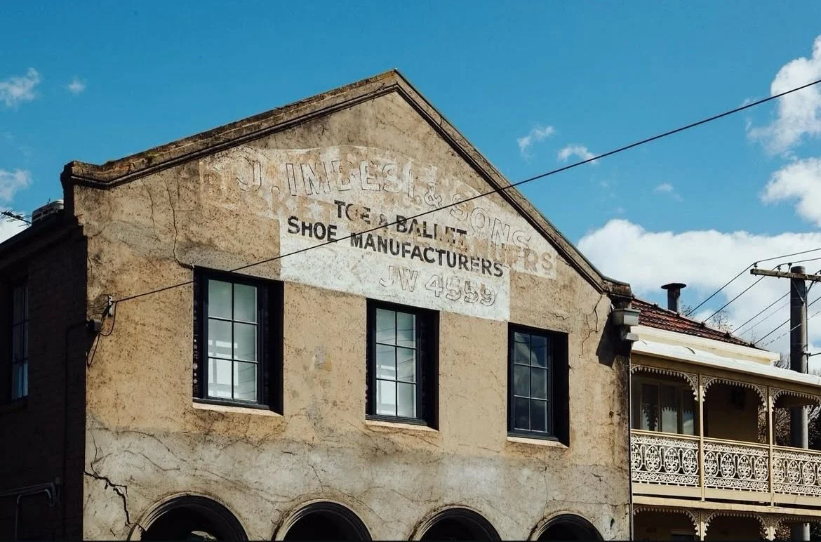 Old shoe manufacturers, new stories&mdash;this is the Fitzroy I can&rsquo;t stop photographing.

Every corner holds a memory if you slow down long enough to see it.

#melbourneinnernorth #ghostsign #ghostsigns #urbanhistory #melbourneheritage
