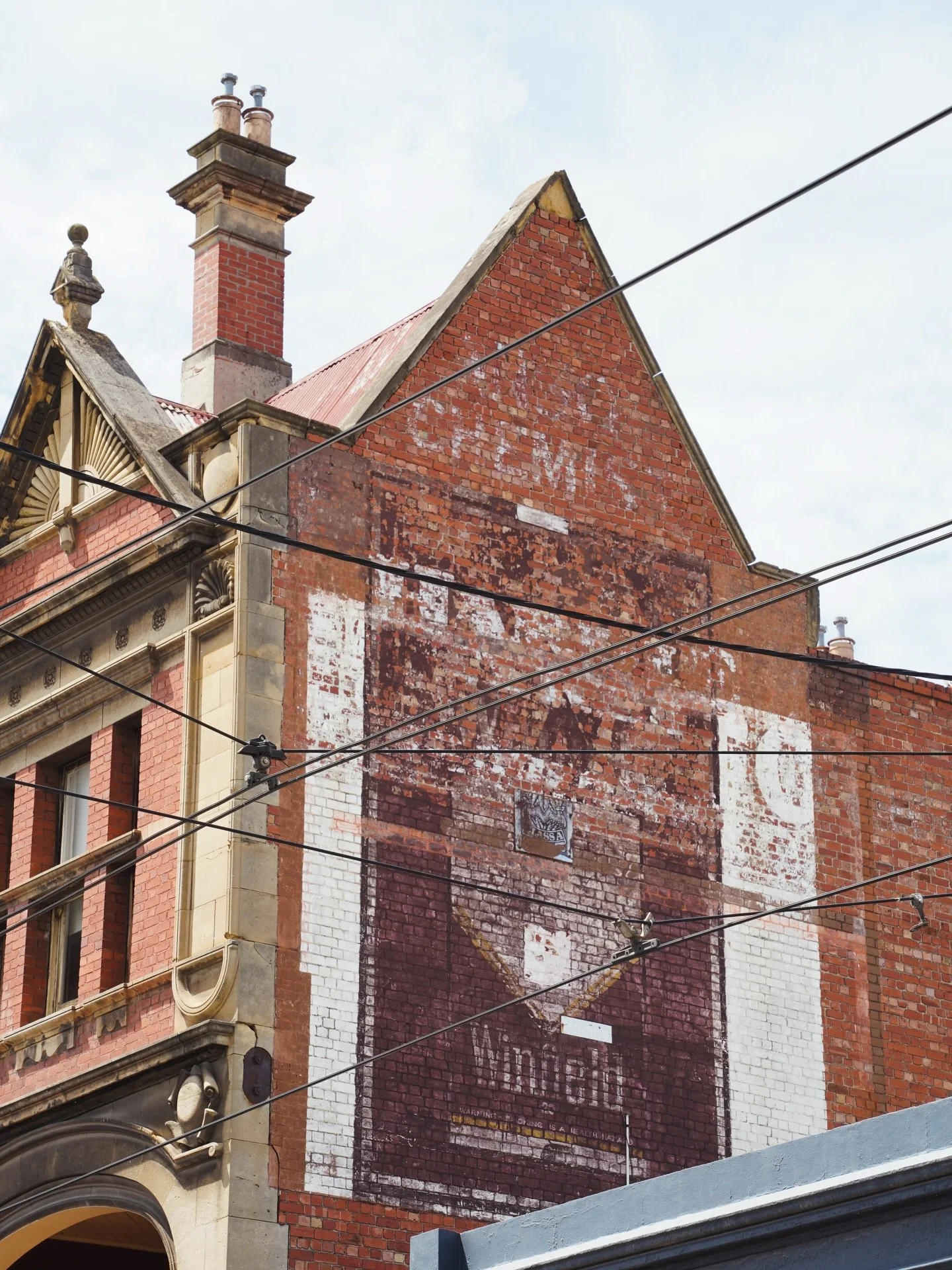 Faded lettering. Brick worn smooth by decades of weather and work. A fragment of Fitzroy&rsquo;s commercial past, still holding its place.

#hiddennorth
#ghostsigns
#fitzroy
#melbournearchitecture
#mekbournephotohraphy