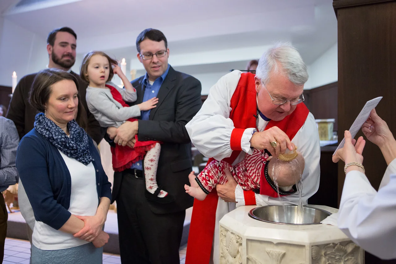 "I baptize you in the name of the Father, and of the Son, and of the Holy Spirit." This photo is from a baptism on the Feast of the Baptism of our Lord, January 10, 2016.