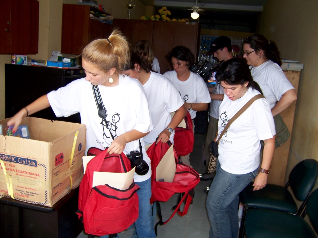 thumb_filling the 400 back packs with scholol supplies_1024.jpg