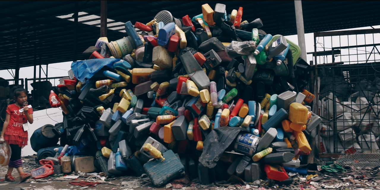 Heaps of imported plastics waiting to be sorted in China.