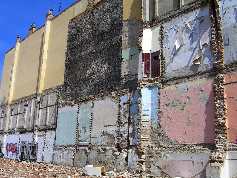 Falling-down pastel buildings in Hungary