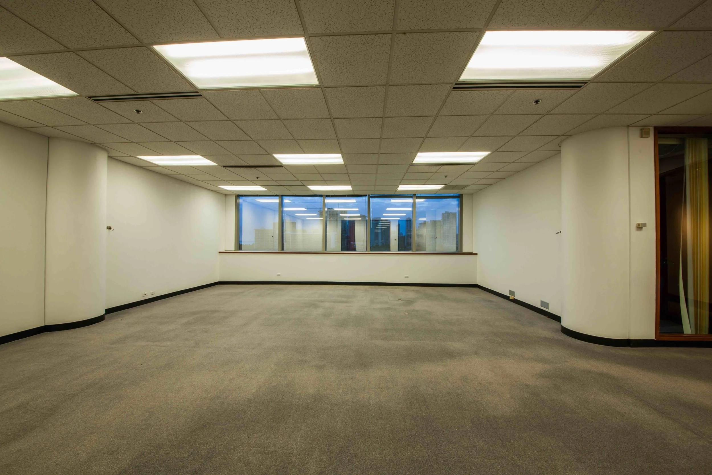 Spacious suite with four private offices. Window views of Waikiki, and the ocean. Kitchen with running water. Ideal office for large company. 