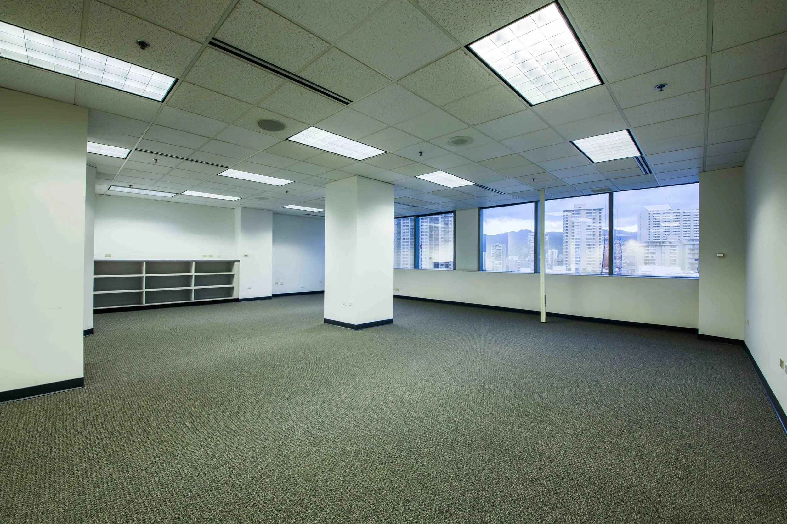 Well appointed office with new carpet and new paint. Wall to wall windows with views of Kalakaua Avenue, Waikiki Galleria Tower and Diamond Head. Fantastic private corner office with curved window views of Kalakaua and Diamond Head.