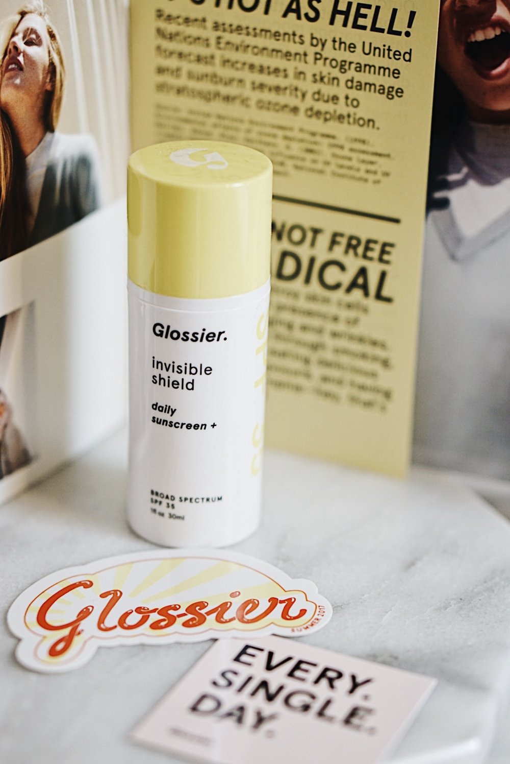 Glossier Sunscreen - Invisible Shield | Review, First Impressions, &  Discount — C H Y