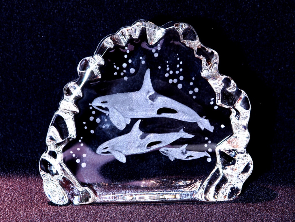 hand engraved sculpture with killer whale design