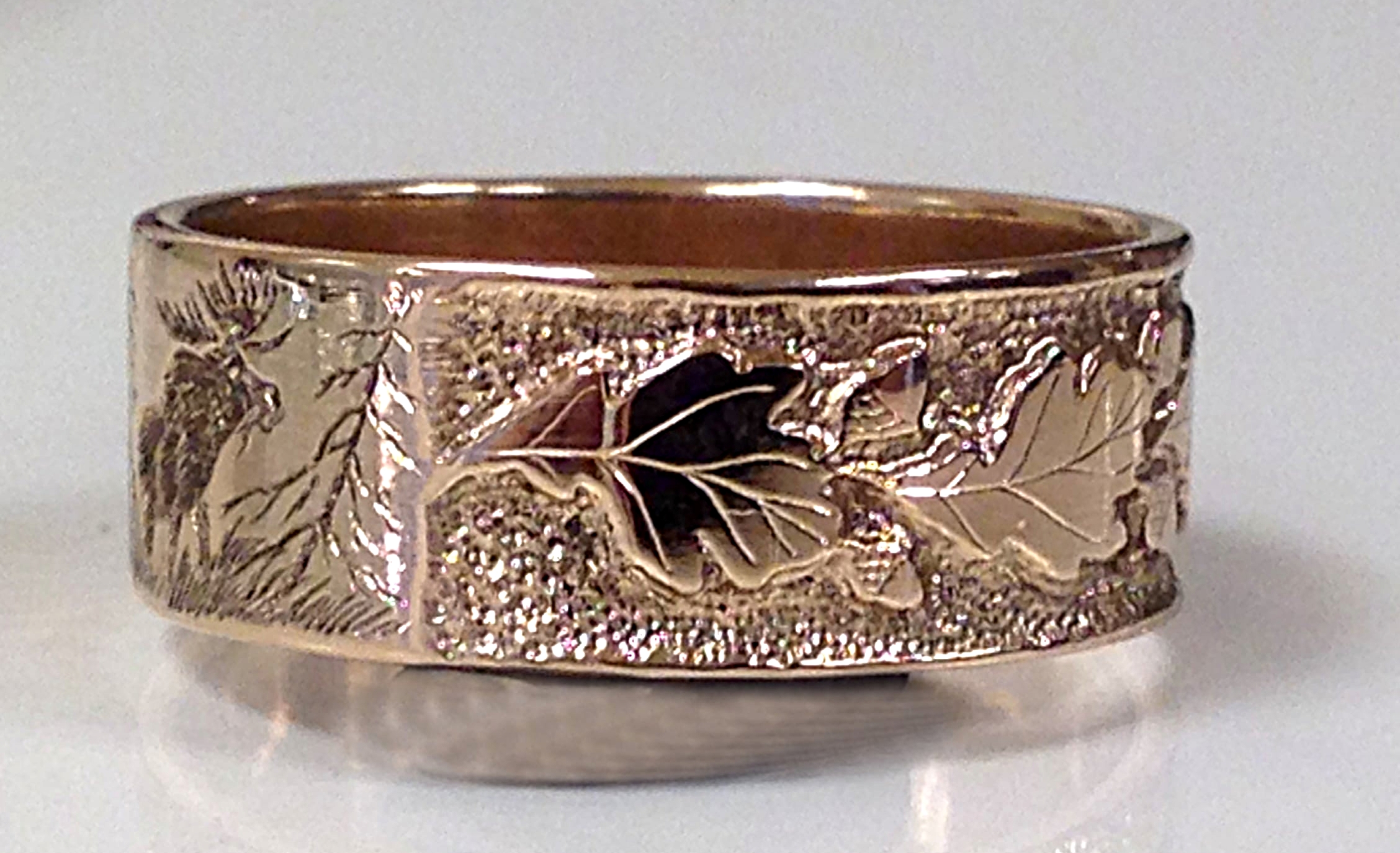 unique custom engraved gold ring with acorn design 
