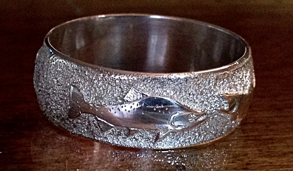 hand engraved ring with wild salmon