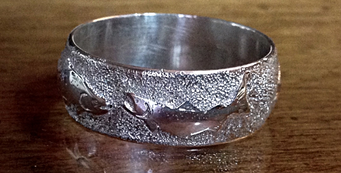 hand engraved ring with wild salmon