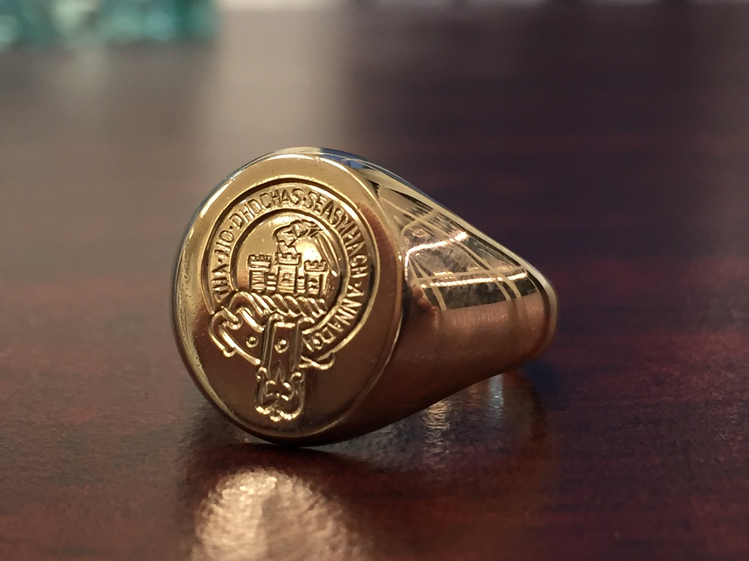 signed ring hand engraved with family crest