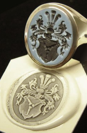 signed ring hand engraved with family crest