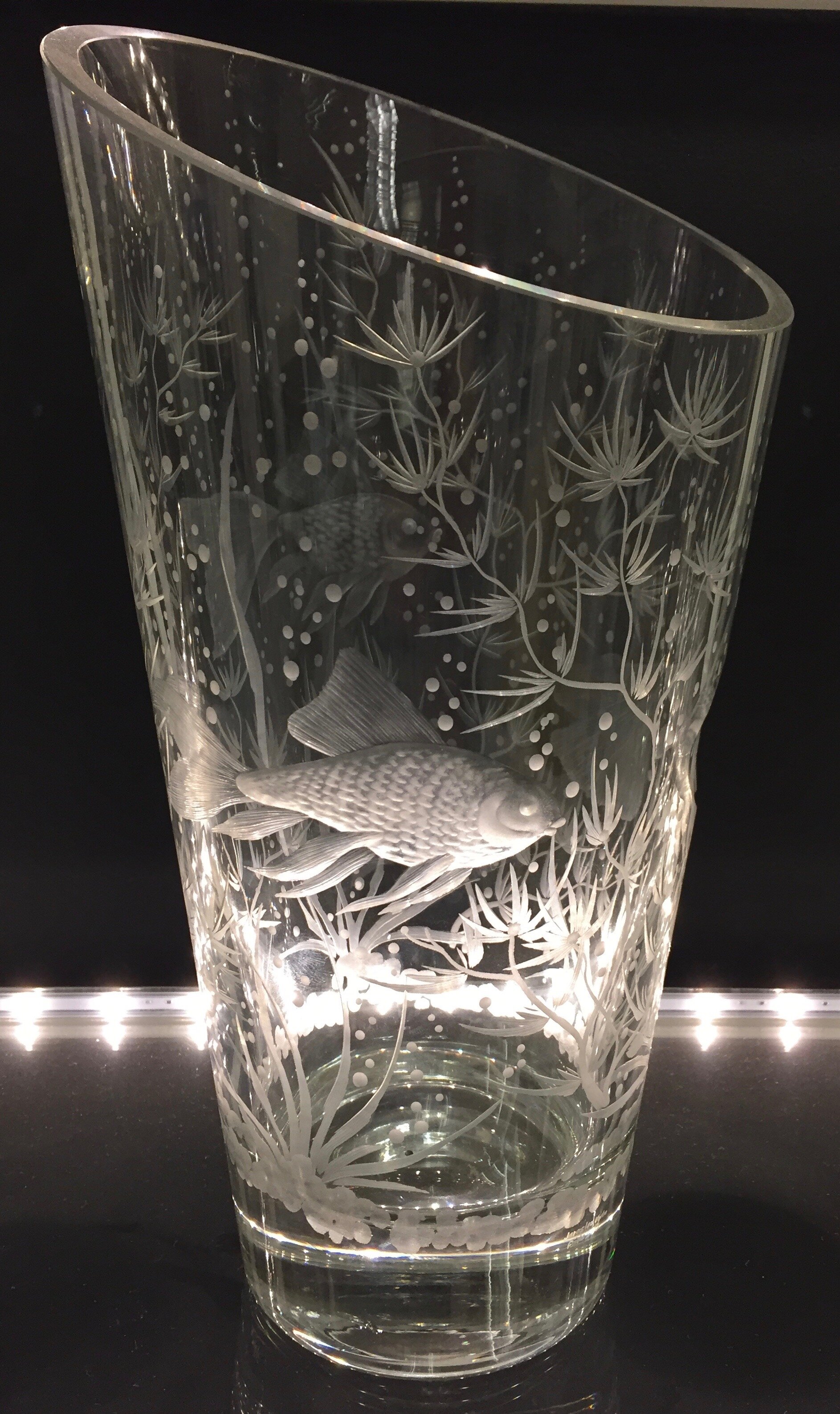 hand engrave crystal vase with fish design vase is engrave with three different fish all around this is # 1 side