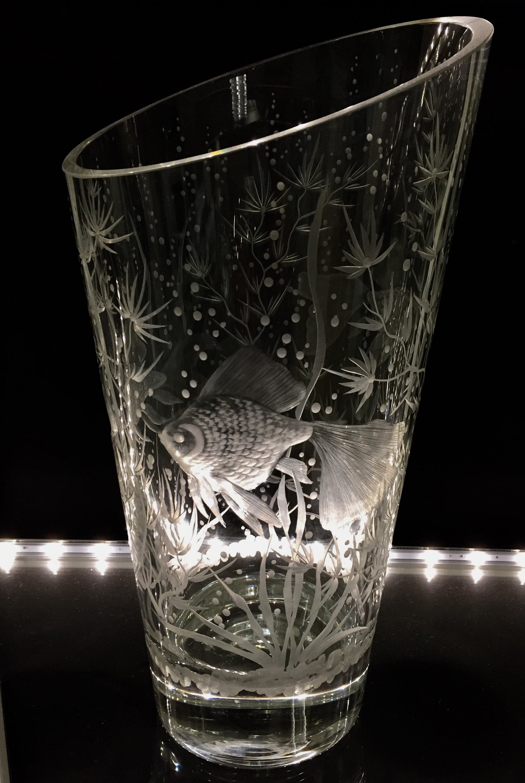 hand engrave crystal vase with fish design vase is engrave with three different fish all around this is # 2 side