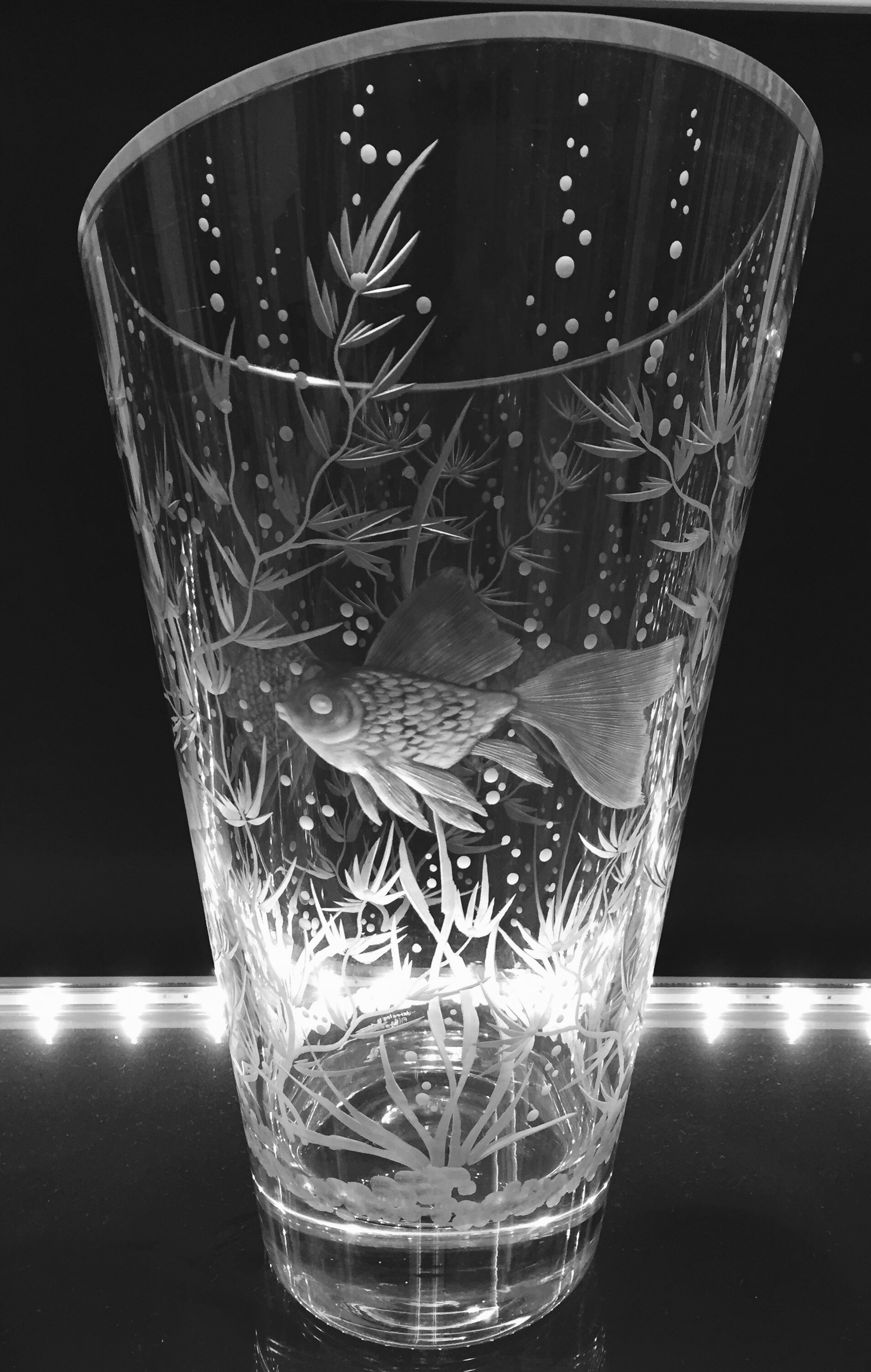 hand engraved crystal vase with fish design