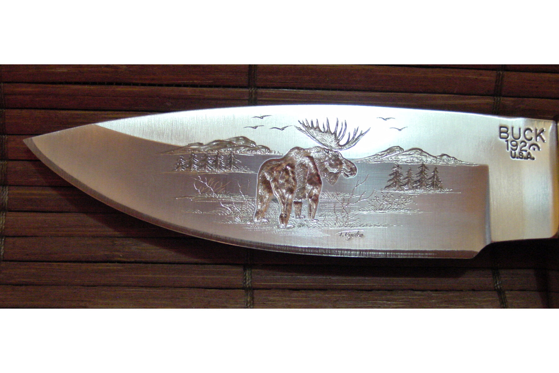 custom unique hand engraved knife with moose and elk and mountain scene 