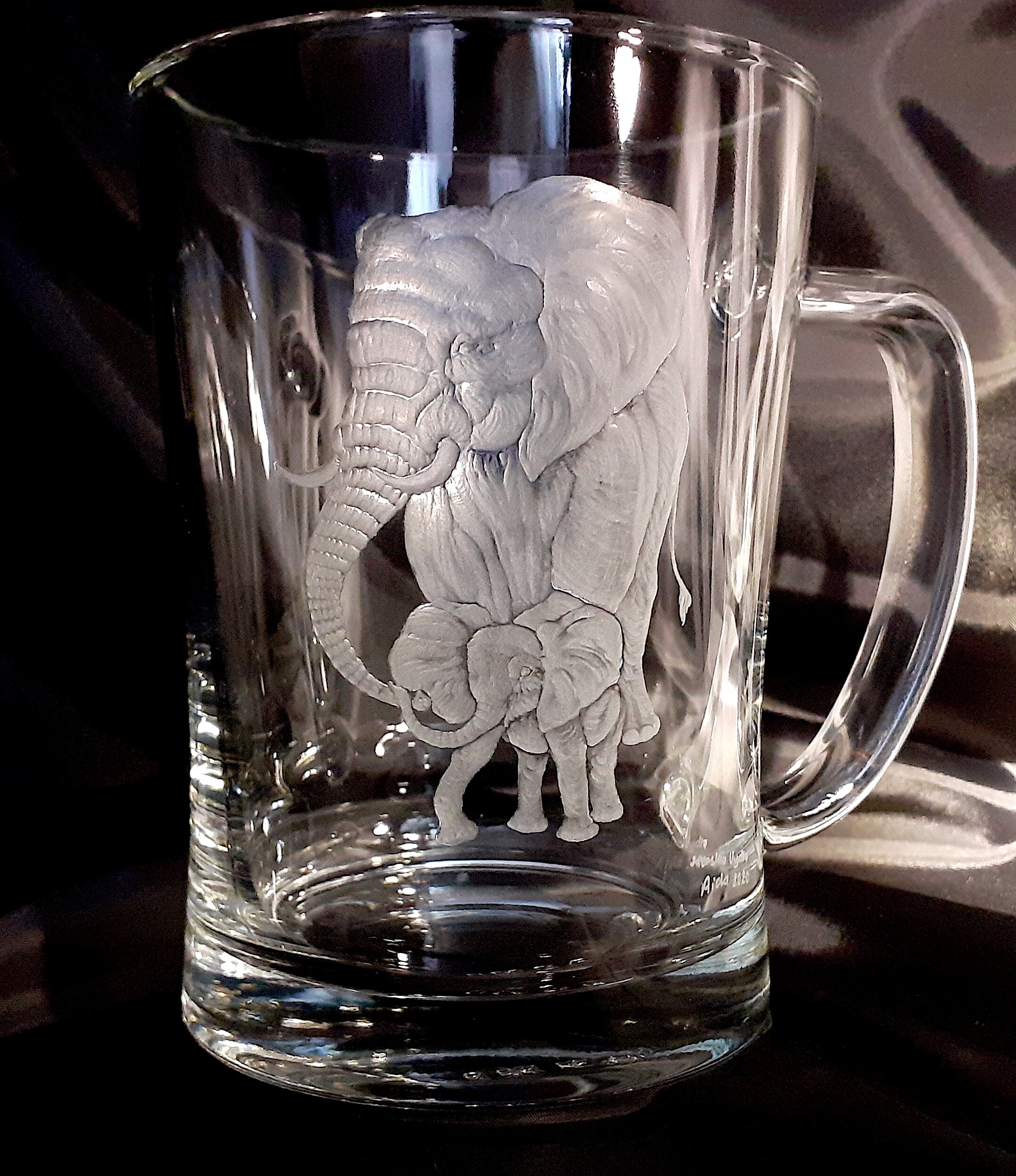 beer mug hand engraved with elephant mom and baby elephant 