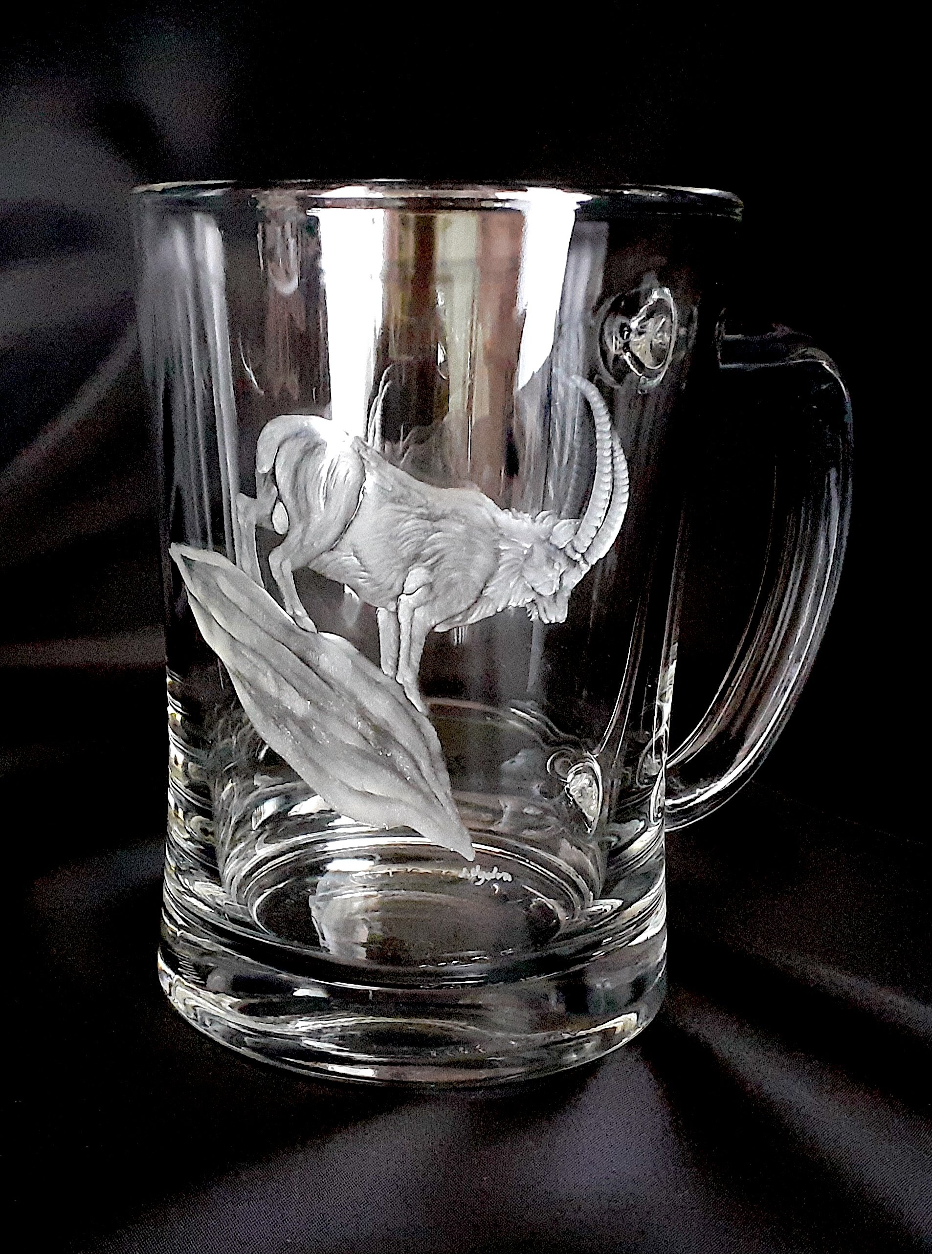 beer mug hand engraved with moutain goat 