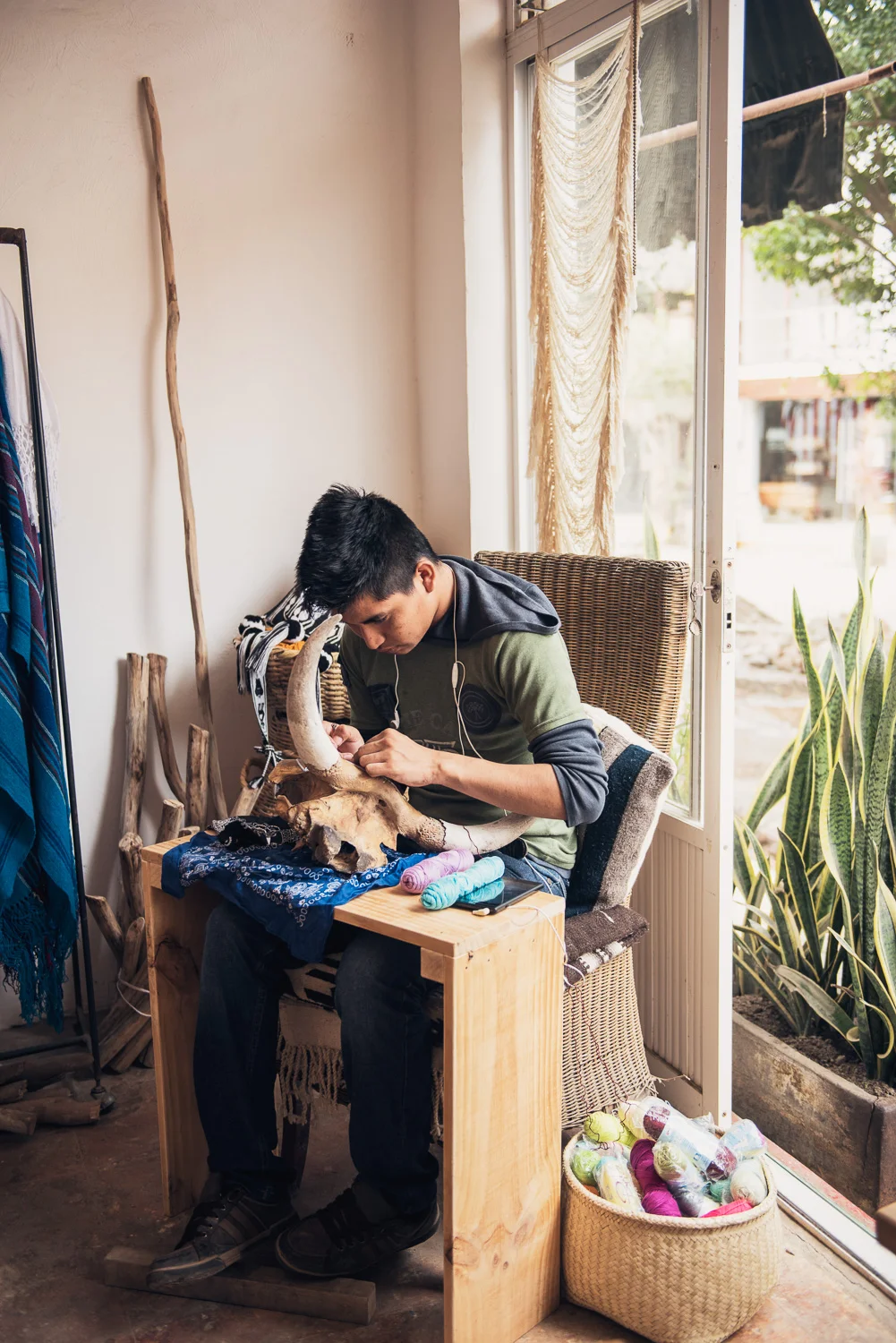Hand weaving onto a skull at Evoke the Spirit // Sayulita, Mexico // Ashley Petersen Photo