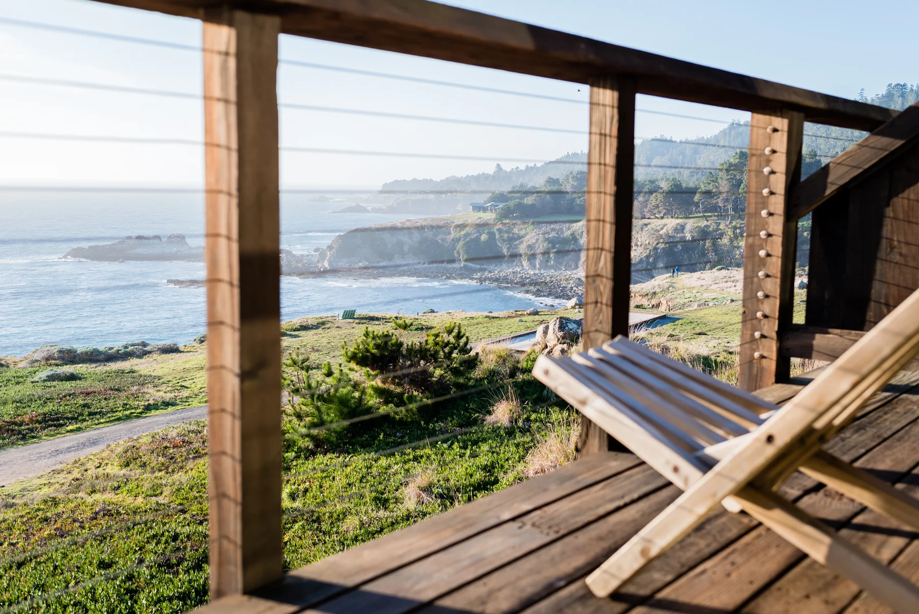 The balcony of a Ocean View King on the second floor at the Timber Cove Resort
